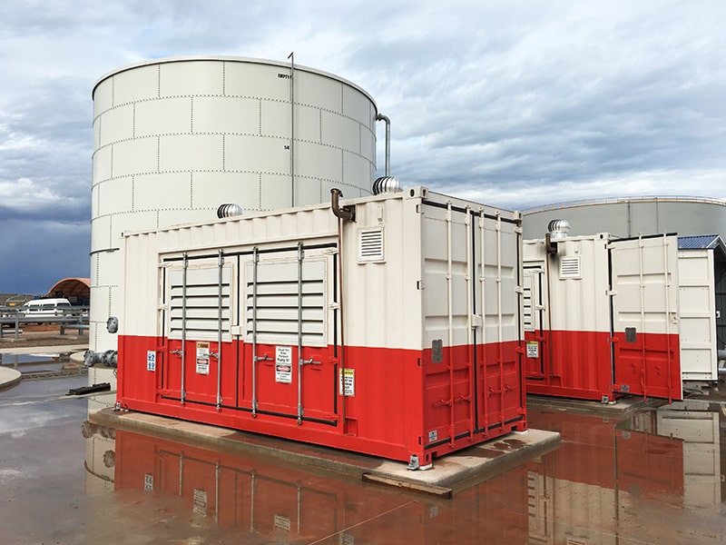 Fire hydrant system installed within a shipping container for noise levels are greatly reduced.