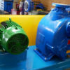 Self-priming pump installed for dam dewatering.