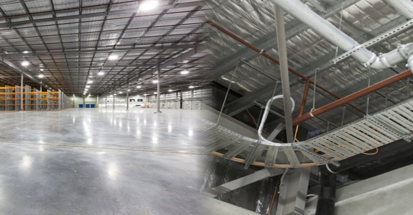 Split view of the Aldi Brendale industrial warehouse facility, showing the vast empty floor space and complex ceiling pipework and cable trays for industrial plumbing systems