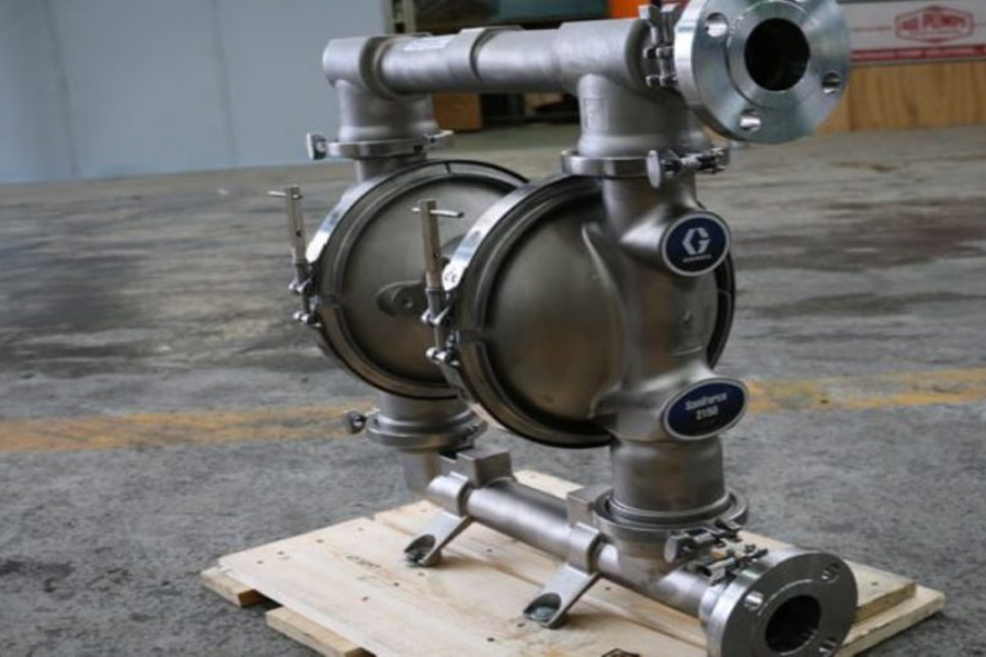 Close-up side view of the Graco Saniforce 2150 AODD pump, a stainless steel pump ideal for sanitary and high-viscosity fluid handling in manufacturing.