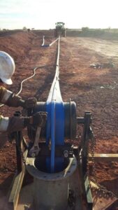 All-pumps technicians and engineers installing a submersible bore pump for mine dewatering