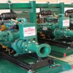 Three green Pioneer Dewatering Pumps
