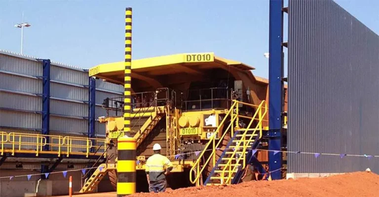 Mining truck in a heavy truck wash bay