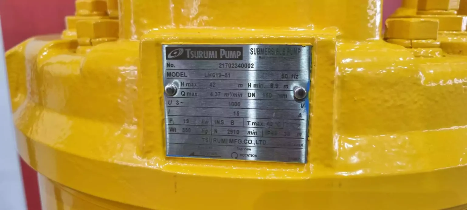 yellow tsurumi hydraulic pump with tech spec plate