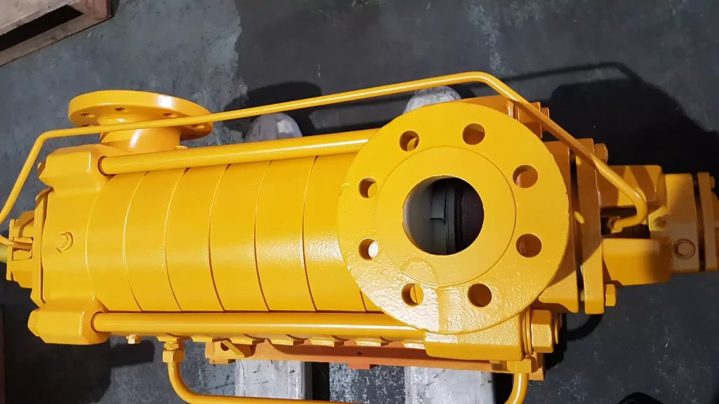 Bright yellow horizontal multi-stage centrifugal pump for high-pressure fluid transfer and booster services, custom-built by all-pumps for a challenging mine site application requiring heavy-duty performance