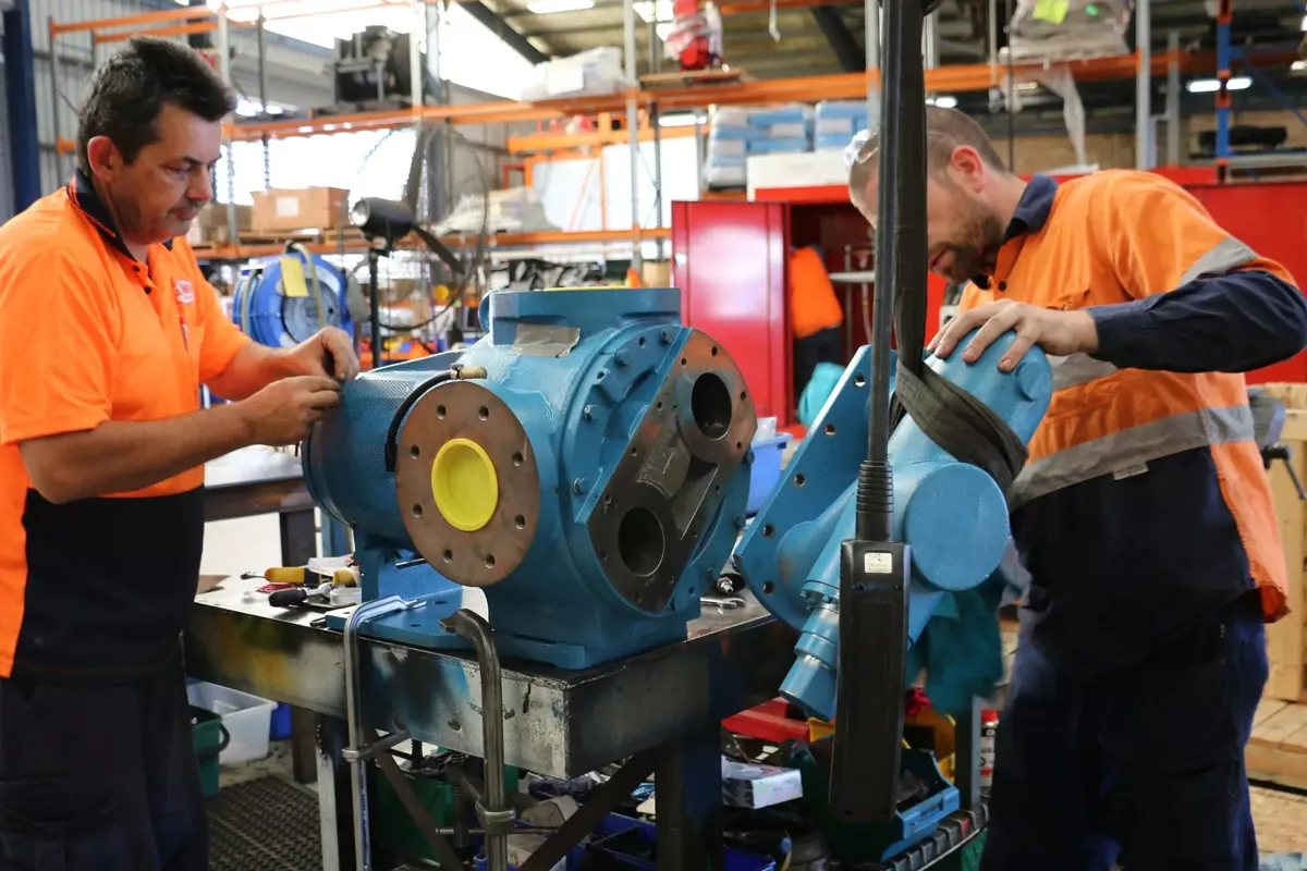 Blue industrial pump in an Alfa Laval workshop