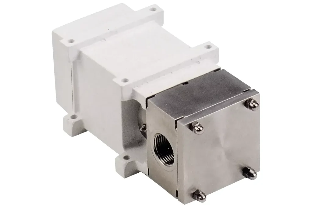 Metallic Packo pump components on a white background