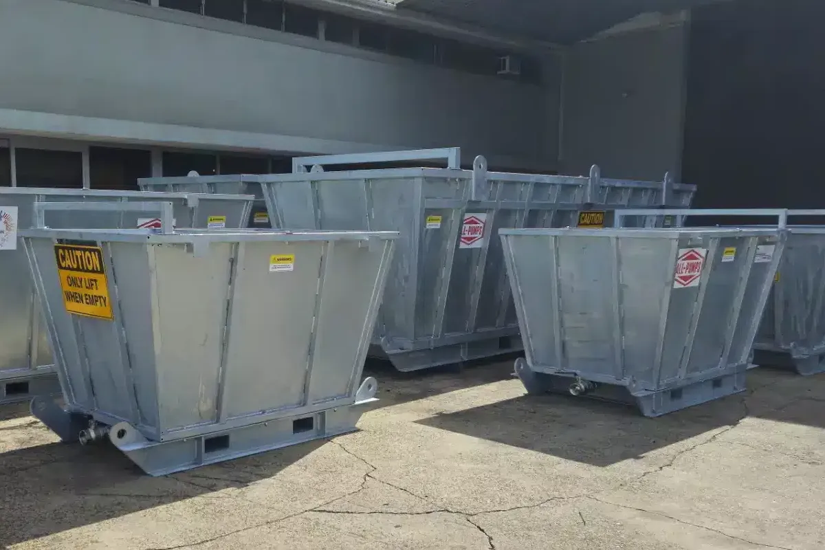 Several gray tank units inside a warehouse