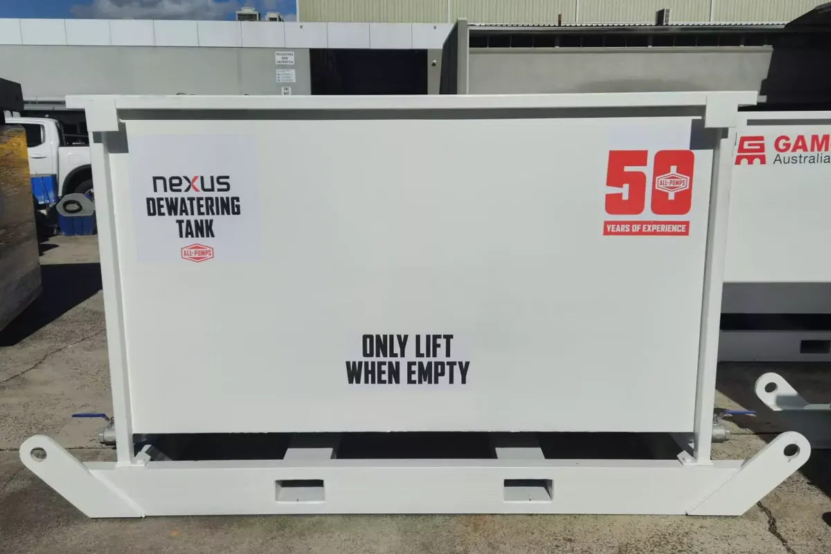 Close view of a white tank marked dry lift