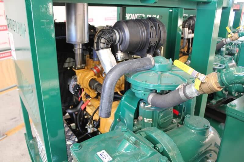 Three green Pioneer Diesel Pump engine and exhaust for mine dewatering